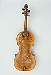 2006AN7824-01
&copy; Victoria and Albert Museum, London
Violin bearing the coat of arms of James II surrounded by leaf motifs. Britain, late 17th century