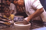 1000MP0024-01
&copy; Elizabeth March-Penney
Shaping Pots by Hand, photo Elizabeth Marchpenny. Late 20th century