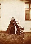 2006BF8121-01
&copy; Victoria and Albert Museum, London
Queen Victoria in a garden, photo W & D Downey. England, 19th century